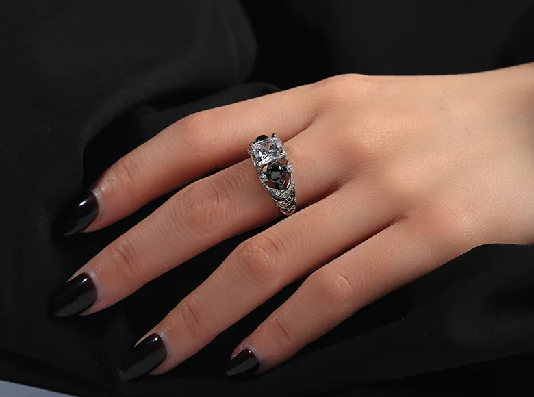 Model wearing a skull engagement ring