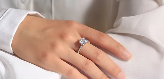 Women with Pavé Moissanite Engagement Ring In Platinum