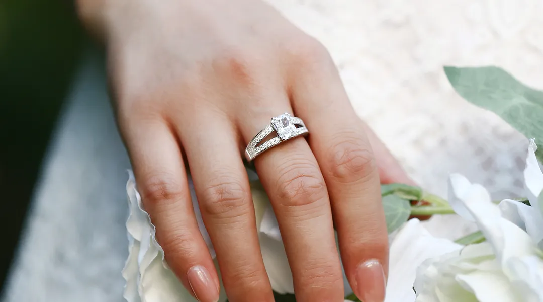 Women with Flower and White Gold Engagement Ring