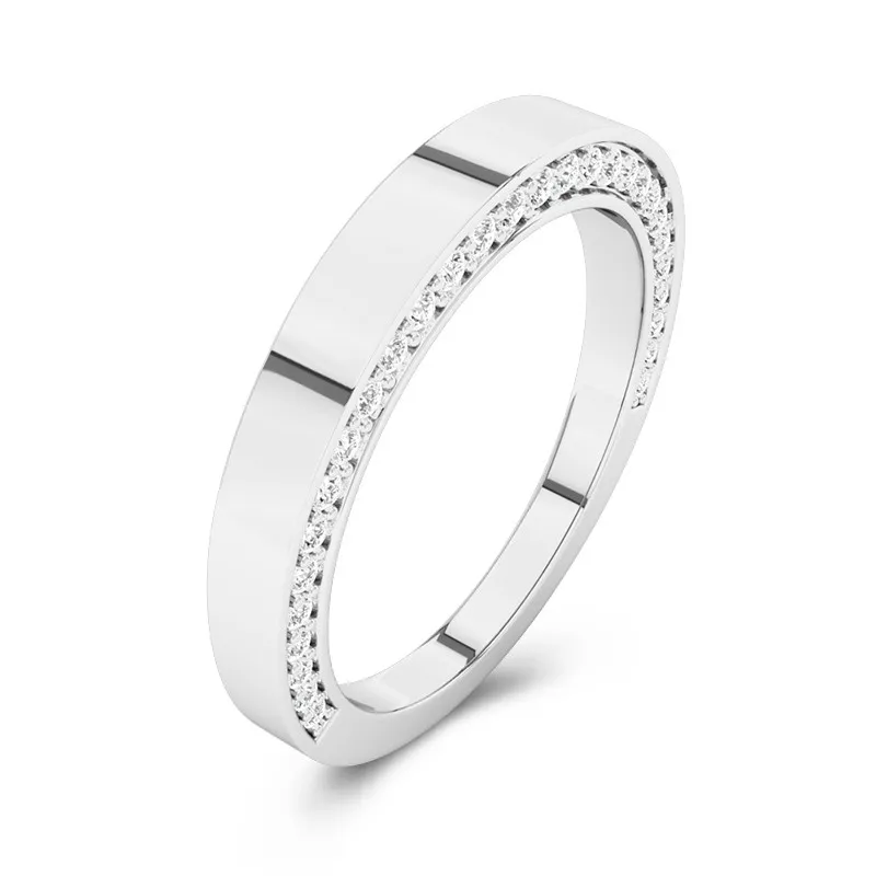 Understated Moissanite Wedding Band