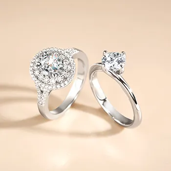 double halo engagement ring and solitaire engagement ring