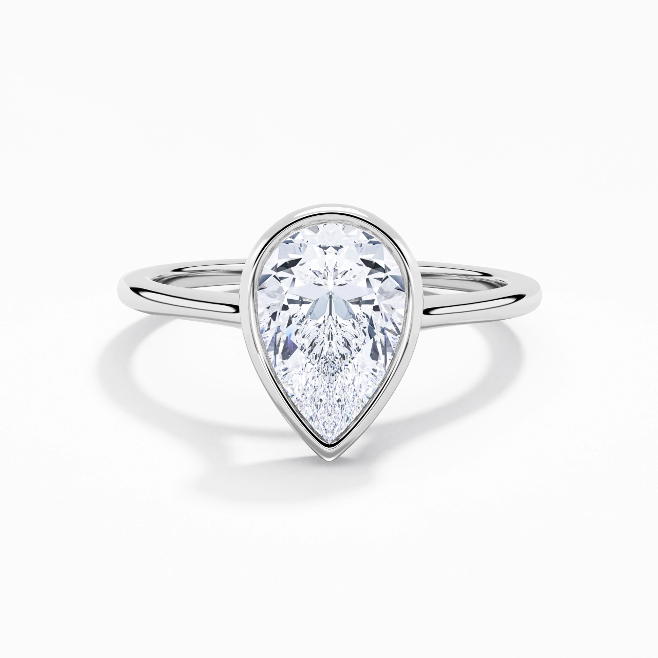 Understated Pear 1.50ct Moissanite Engagement Ring