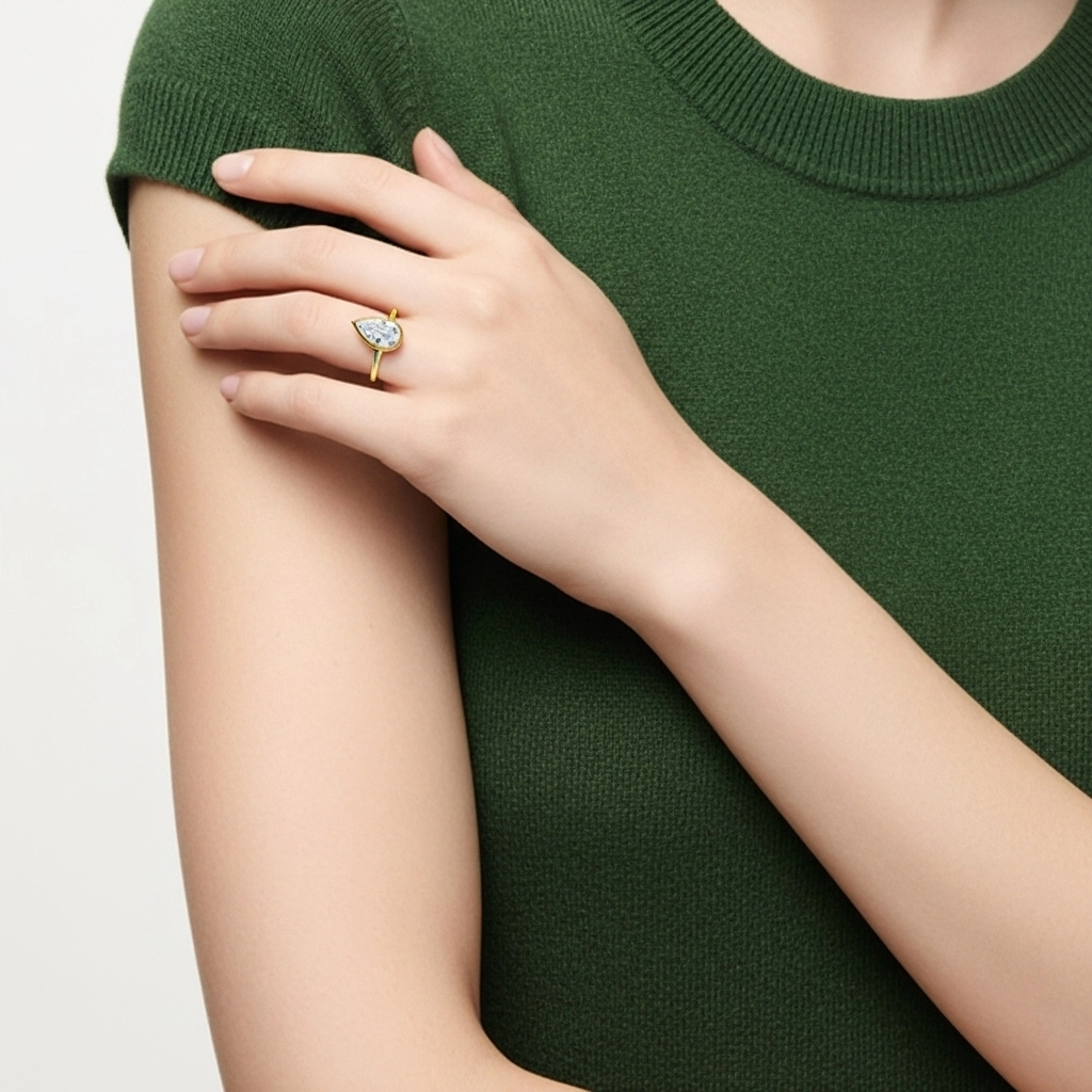 Understated Pear 1.50ct Moissanite Engagement Ring